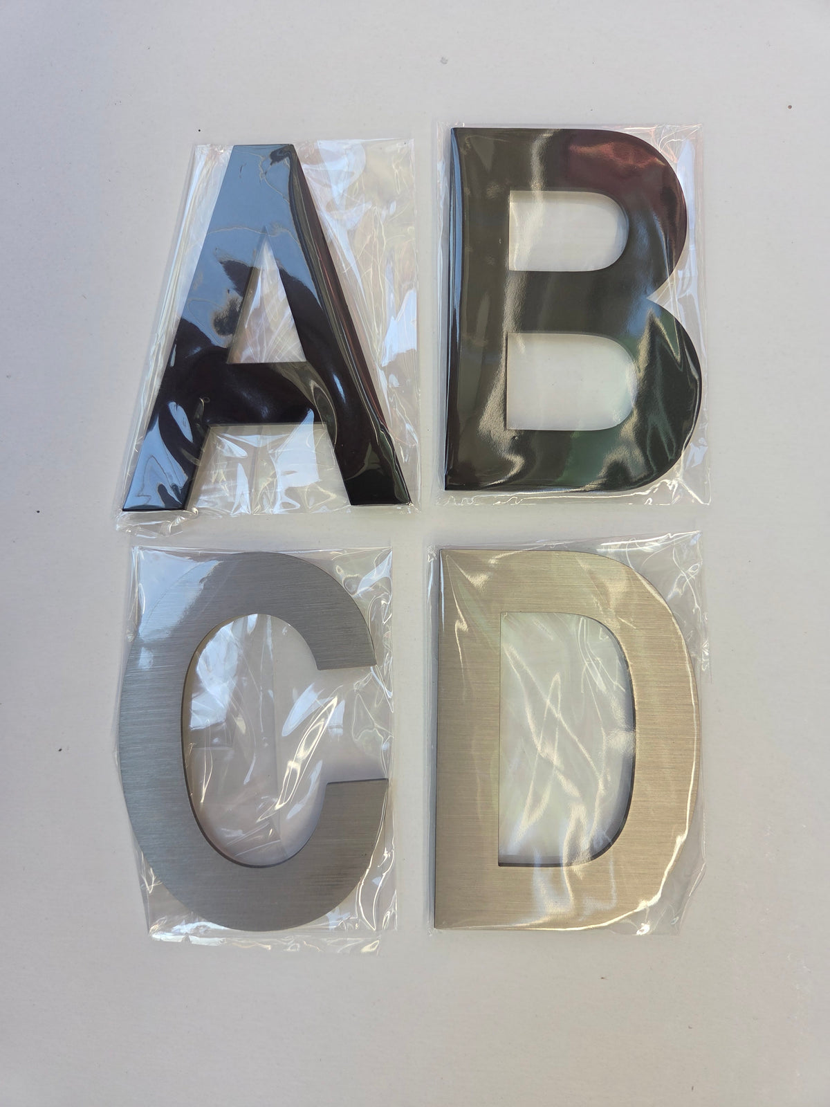 RVS Huisnummers & Letters – Zilver & Zwart (Zelfklevend)